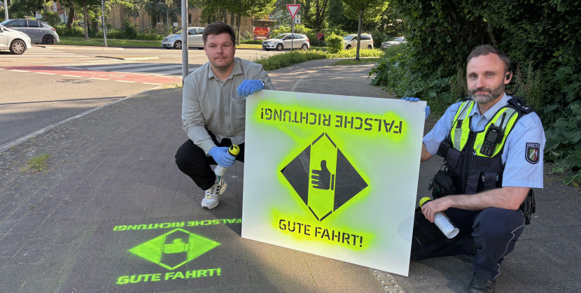 Sprühaktion gegen Geisterradler am Berliner Platz